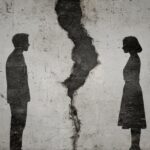 silhouette of male and femal with break, crack between them, concept of Legal Separation vs. Divorce
