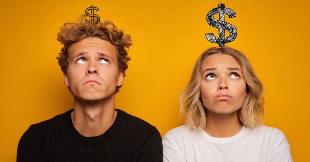 young couple with US dollars on their heads, concept of What Happens to Your Finances After Divorce in New Jersey