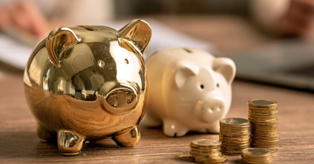 2 piggy banks with coins, concept of Can My Wife Take Half My Savings in a New Jersey Divorce?